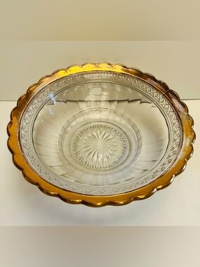 Cut glass bowl, gilded gold trim, scalloped edge.